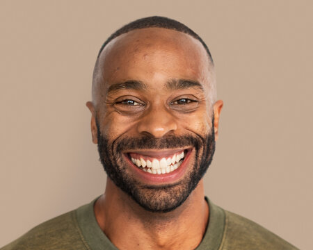 Handsome man smiling, happy face portrait close up