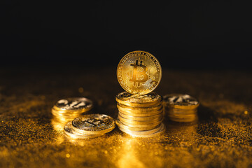 bitcoin growth,bitcoin coins stacked on black gold background