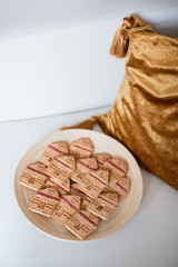 Christmas cookies house near Christmas tree