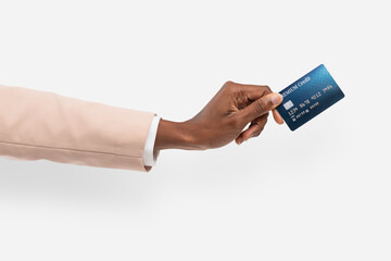 Credit card finance held by a hand for banking campaign