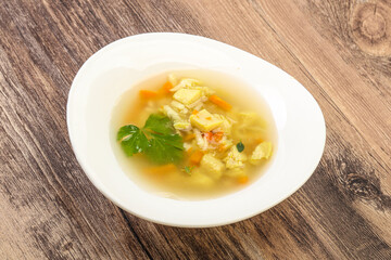 Tasty chicken soup with carrot