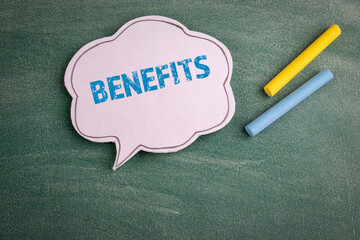 BENEFITS. Speech bubble on a green chalkboard