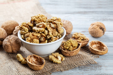 Purified walnuts in a white bowl