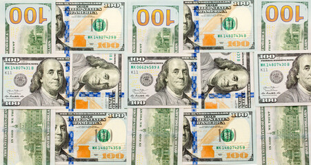 One Hundred Dollar Banknotes are creatively laid out. Money banknotes of US dollars, a lot of...