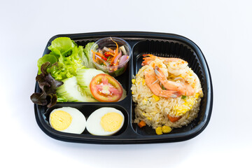 Thai food lunch box in plastic packages, Authentic Thai Fried Rice With Shrimp.