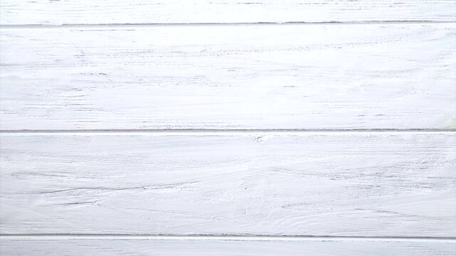 Valentines day background with red heart, stop motion animation, frame. Love heart on the white wooden background