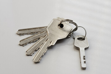Bunch of keys against on a white background.