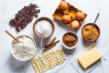 Ingredients for making chocolate chip cookies, flat lay, top view.