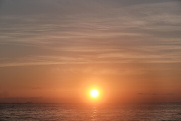Naklejka na ściany i meble Seascape. Dawn over the Atlantic Ocean.