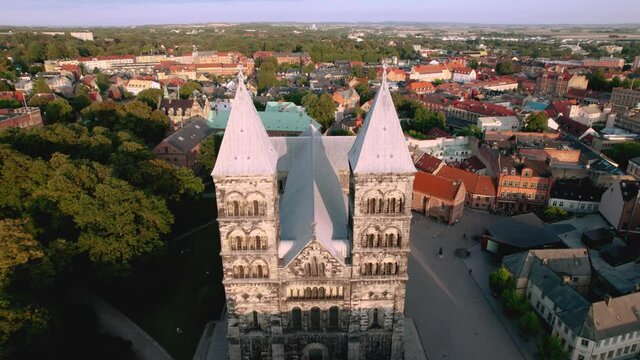Aircraft flying between Lund Cathedral towers, Sweden