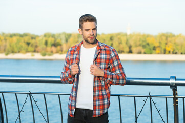 young unshaven guy outdoor. male fashion model. mens beauty. casual fashion style.