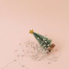 Layout with a Christmas tree on pink background.