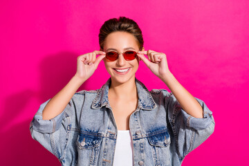 Photo of young happy positive cheerful woman smile good mood wear sunglass isolated on pink color background