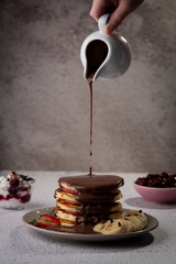 pancake whipped cream fruits and chocolate sauce 