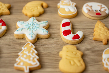 Merry Christmas with homemade cookies on wood table background. Xmas, party, holiday and happy New Year concept