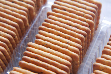 close up of sweet cookies on wooden table 