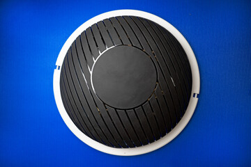 Bosu modern gym ball on blue mat top view