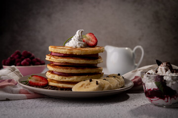 pancake whipped cream fruits and chocolate sauce 