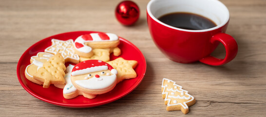 Merry Christmas with homemade cookies and coffee cup on wood table background. Xmas eve, party, holiday and happy New Year concept