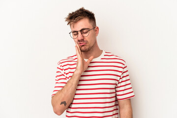 Young caucasian man isolated on white background having a strong teeth pain, molar ache.