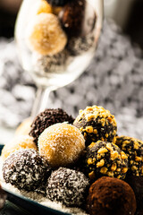 coconut cocoa and walnut balls in a wine glass