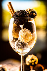 coconut cocoa and walnut balls in a wine glass
