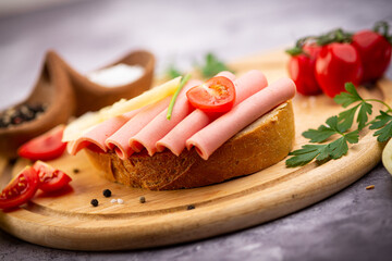 sandwich in traditional style on wooden plate