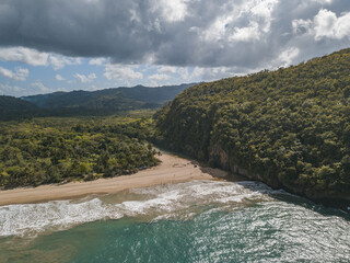 Landscape of El Valle Beach surrounded by greenery and sea in Samana, the Dominican Republic