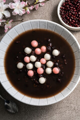 Red and white tangyuan with red bean soup.
