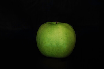 green apple on black