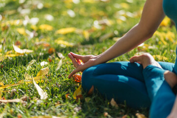 meditation and doing yoga on the grass