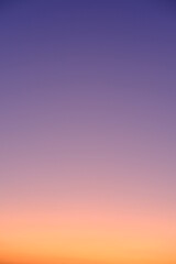 Abstract yellow orange purple gradient color of sky sunset . High vertical quality photo