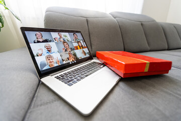 Family online video conference, christmas greetings. Virtual call through screen of laptop, gift....