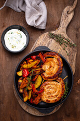 Baked chicken sausages with vegetables