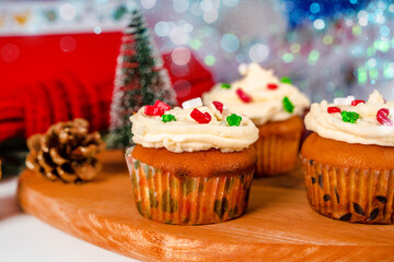 Cupcakes decorated with sprinkles in the form of a Christmas tree. Festive sweet treats, Christmas dessert