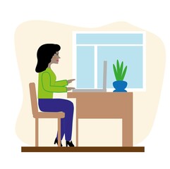Fototapeta premium A girl is sitting at a desk, working on a laptop, home office, remote work, stay at home, be safe.