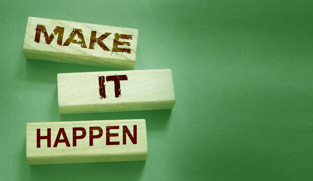 Naklejki Make It Happen written on a wooden blocks. Motivation coaching career and business concept