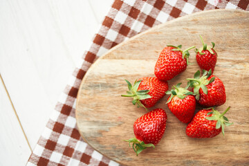 fresh strawberries on wooden board fruit vitamins summer