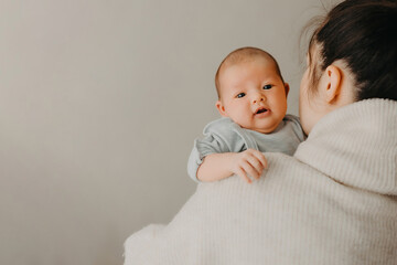 Cute little girl hug cuddle excited young mum, smiling mother and funny small infant daughter have...