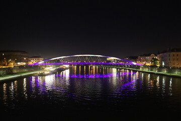 night illumination of the Bernadka bridge over the Vistula in Krakow