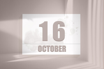october 16. 16th day of the month, calendar date.White sheet of paper with numbers on minimalistic pink background with window shadows.Autumn month, day of the year concept