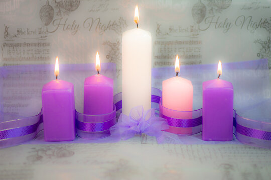Advent candles for Christmas - fifth candle lit