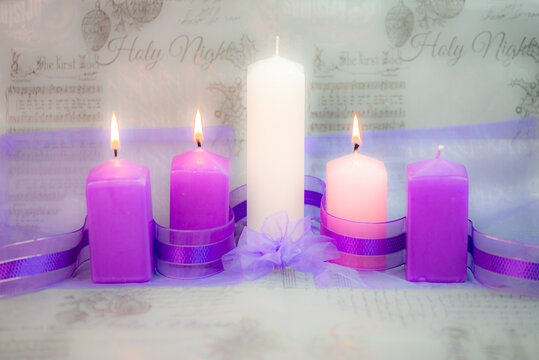 Advent candles for Christmas - third candle lit