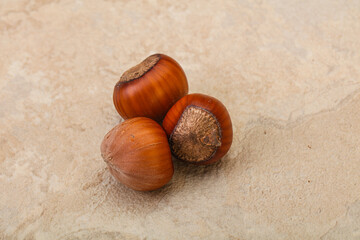 Obraz premium Hazelnut heap isolated over background
