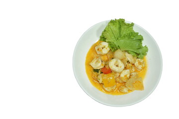 spicy fried squid with onion in egg and curry on plate