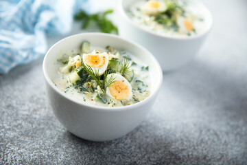 Cold yogurt soup with cucumber and quail eggs