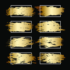 Set of gold paint brush strokes