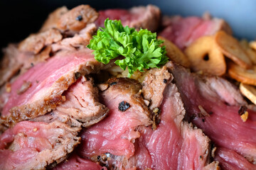 Sliced grilled medium rare beef steak 