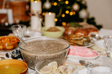 Traditional Christmas 12 lean food on the table in a family waiting for Christmas