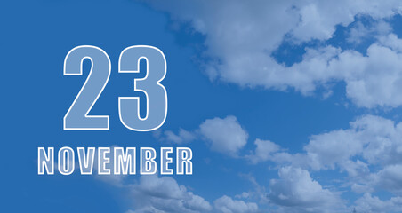 Naklejka na ściany i meble november 23. 23-th day of the month, calendar date.White numbers against a blue sky with clouds. Copy space, autumn month, day of the year concept